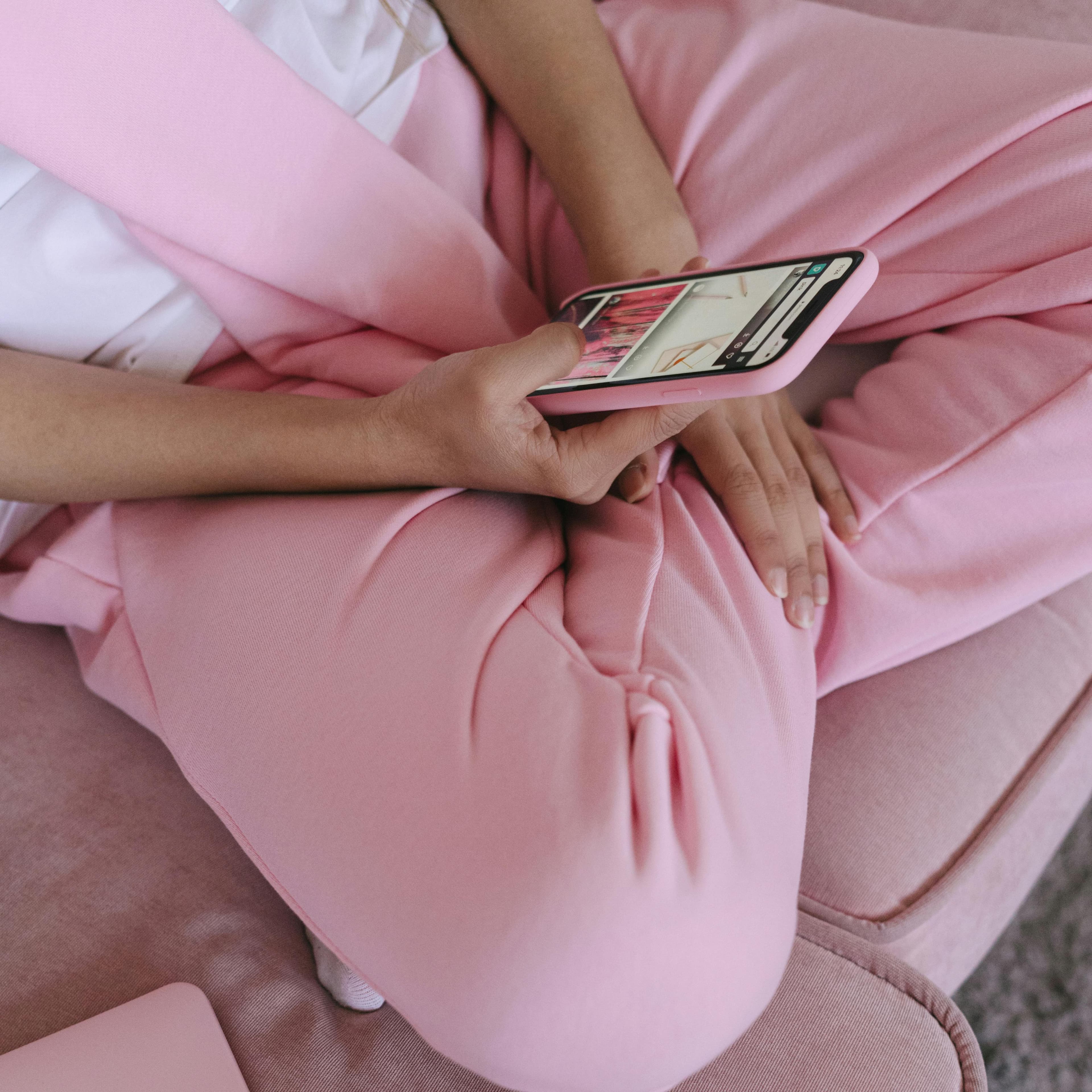 Woman reviewing her MyFertility Report on laptop