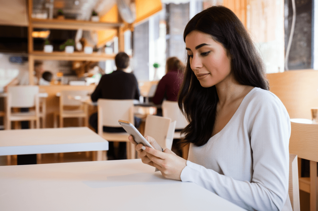 Woman completing fertility questionnaire on phone